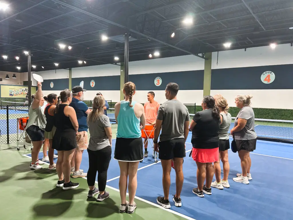Players learning pickleball at DiNK’d